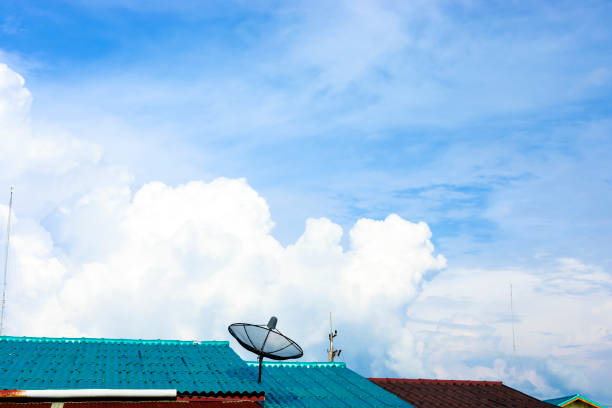 satellite on the roof with sky on background