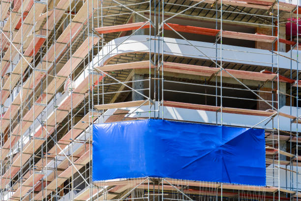 istock Blank space on a scaffolding building for your advertising. blue mockup. 959072042