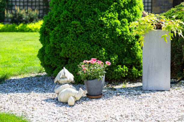 istock Beautiful spring garden, sleepy stone gnome 959085200