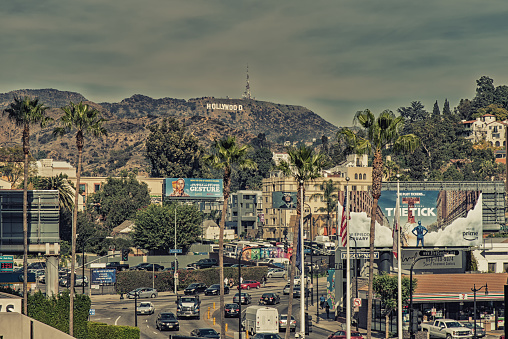 Los Angeles, CA, USA - February 02, 2018: Heavy traffic at hollywood, with the famous sign in the background