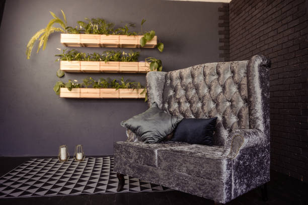 istock Modern living room interior with sofa and green plants,lamp,table on blue wall background. 959090452