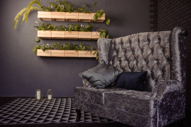 istock Modern living room interior with sofa and green plants,lamp,table on blue wall background. 959090686