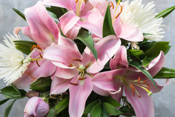 istock Full frame view of bouquet with pink lilies and white chrysanthemums 959093220