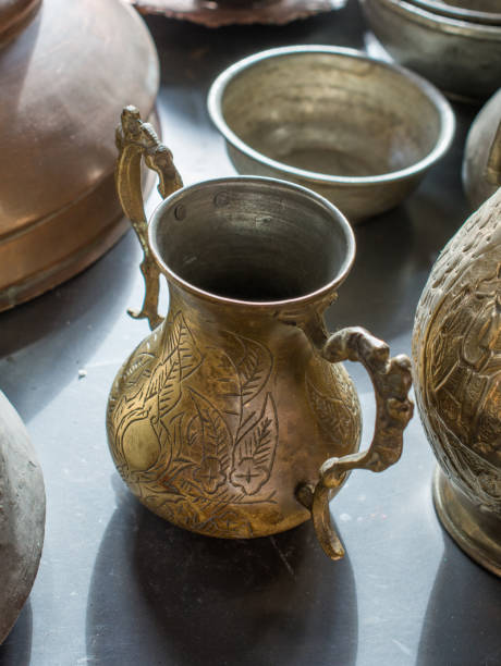 istock Very old style metal ewer water jar 959094100