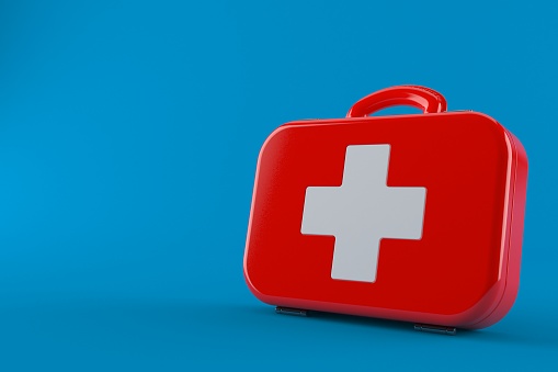 First aid kit isolated on blue background. 3d illustration