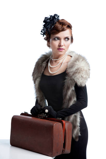 istock Woman in furs and suitcase 959095694