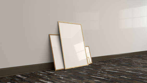 istock Blank white poster in wooden frames standing on the floor 959098028