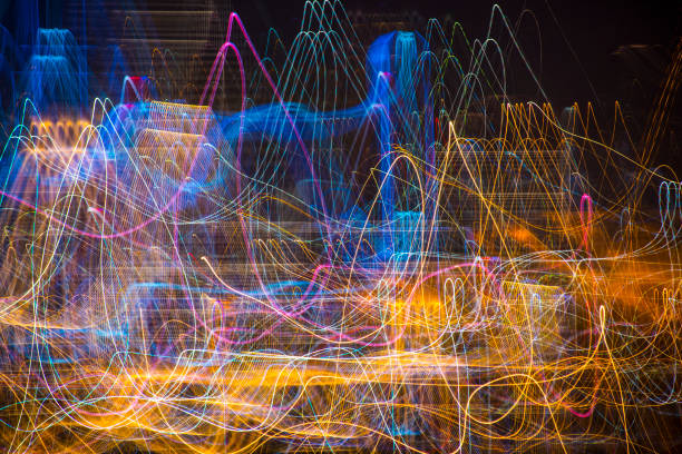 istock Abstract experimental surreal photo , long exposure, city and vehicle lights.Quantum physics and lines of light particles photons 959099980