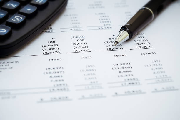 istock Business background, financial data and accounting report concept with pen 959105572