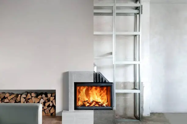 Photo of Installation of wood stove insert in livingroom