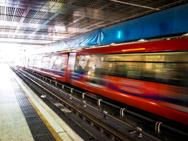 istock Motion blur and light trails of speeding train in London, UK 959113688