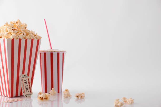 istock Drink popcorn and movie tickets on white background 959115094