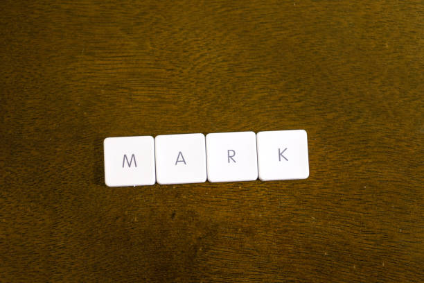 istock WAGE word written on plastic keyboard alphabet with dark background 959115776