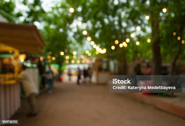 Abstract Blur Festival In The City Park Bokeh Background Stock Photo - Download Image Now