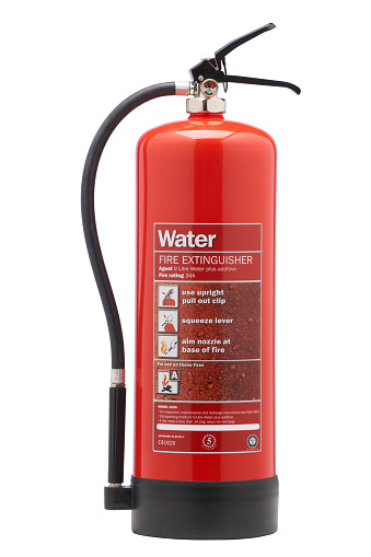 RED WATER FIRE EXTINGUISHER ISOLATED ON WHITE BACKGROUND