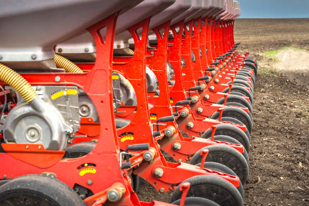 containers of modern seeder with couplers and discs - couplers imagens e fotografias de stock