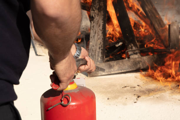 istock Preparedness for fire drill and training to use a fire extinguisher 959128646