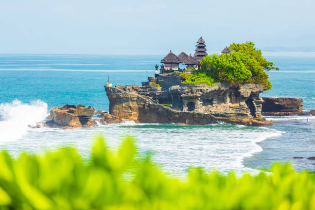 Tanah Lot - Temple in the Ocean. Bali, Indonesia Tanah Lot - Temple in the Ocean. Bali, Indonesia tanah lot stock pictures, royalty-free photos & images