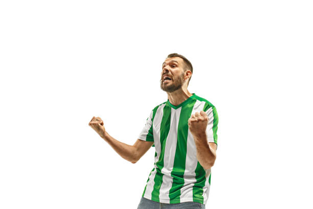 istock Irish fan celebrating on white background 959131138