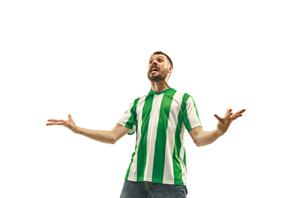 istock Irish fan celebrating on white background 959134052