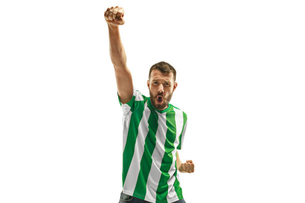 istock Irish fan celebrating on white background 959134218