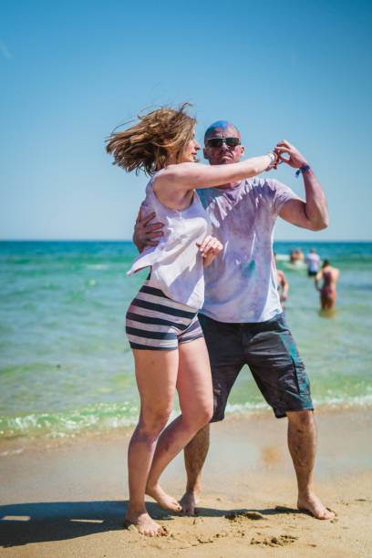 istock Couple dancing on the beach 959134408