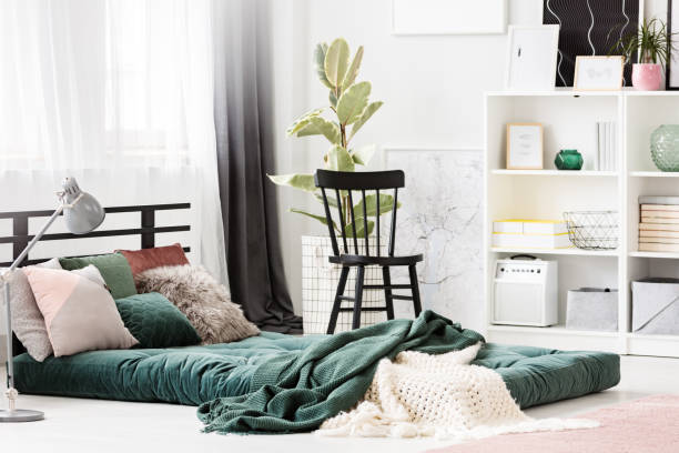 istock Green mattress in bedroom interior 959135306