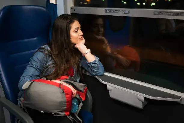 Photo of People traveling by train