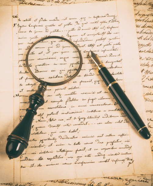 istock Fountain pen and magnifying glass 959148020