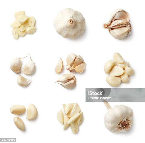 Set Of Fresh Whole And Sliced Garlics Stock Photo - Download Image Now - Garlic, Cut Out, High Angle View