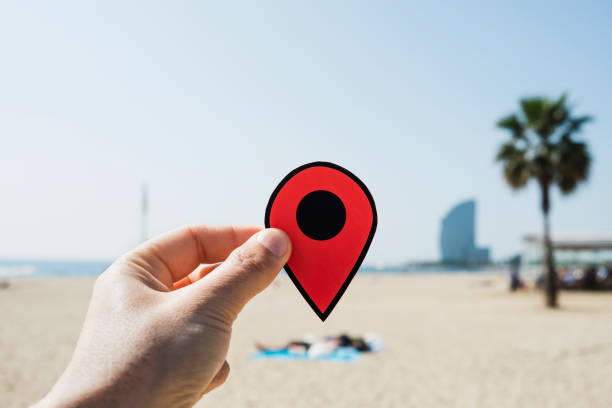 istock man with a red marker in La Barceloneta beach 959153754
