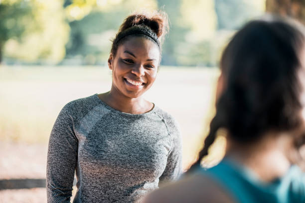 istock Two friends talking in the park after workout 959161646