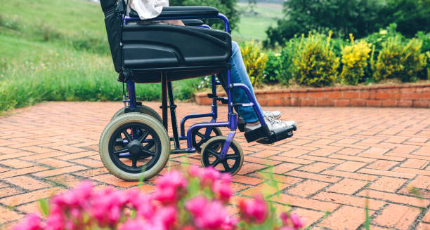 istock Unrecognizable elderly woman in a wheelchair 959167014
