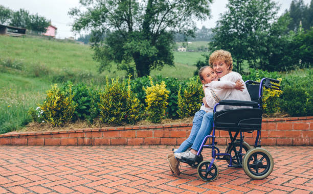 istock Granddaughter hugging her grandmother 959167274