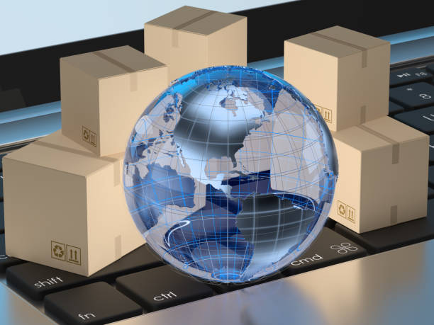 istock Earth and cardboard boxes on laptop keyboard 959172756