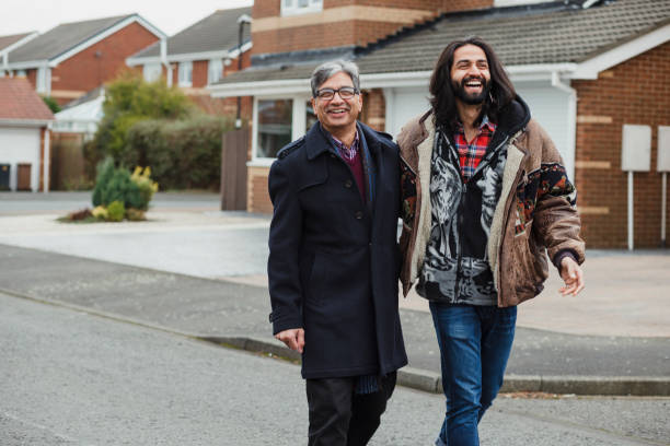 istock Happy Father and Son Walking Home Together 959175980