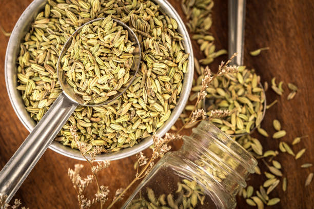 istock close up  fennel seed in  spoon on brown wooden table 959179514