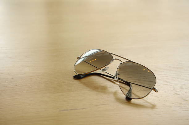 istock black sunglasses for summer travel on wood table background 959180782