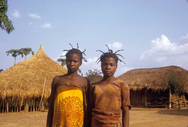 Congo, Central Africa, 1974. Two young African women with special tribal hair style.