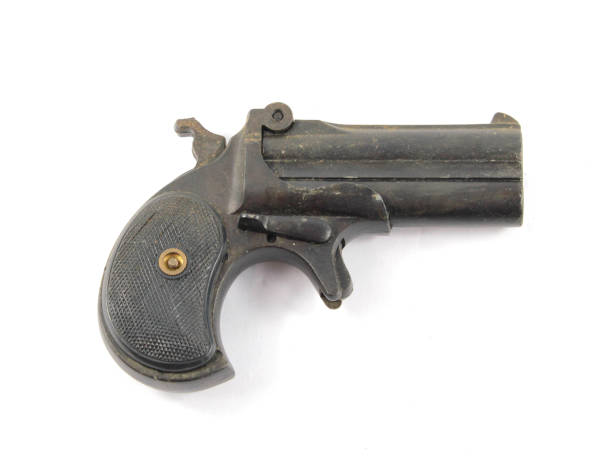 istock Antique Pistol Gun Revolver On White Background 959184678