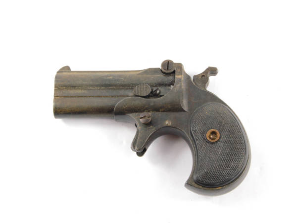 istock Antique Pistol Gun Revolver On White Background 959184756