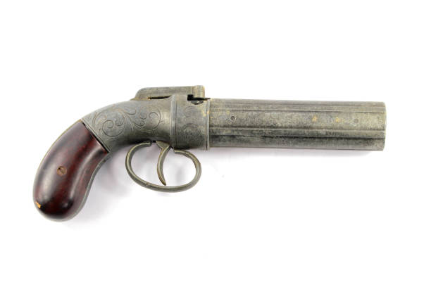 Antique Pistol Gun Revolver On White Background