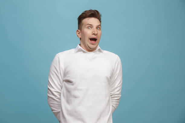 istock The young attractive man looking suprised 959186348