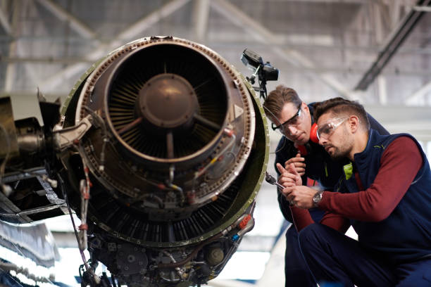 istock Aircraft mechanics in the hangar 959186364