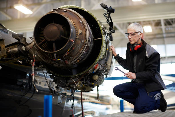 istock Aircraft mechnic in the hangar 959186440