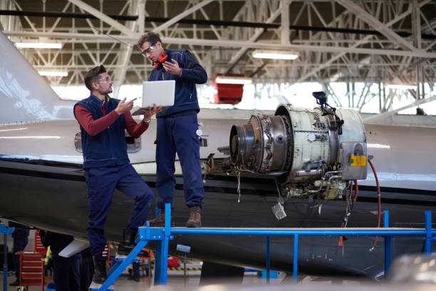 istock Aircraft mechanics in the hangar 959186450