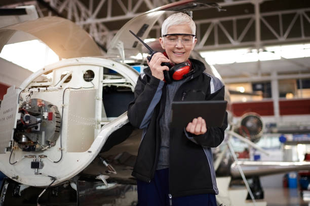 istock Aircraft mechnic in the hangar 959186558