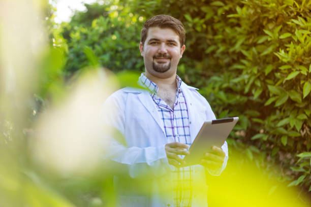istock Farmer conducting research using a digital tablet in a garden 959189344