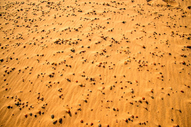 Sand of a beach with small pebbles