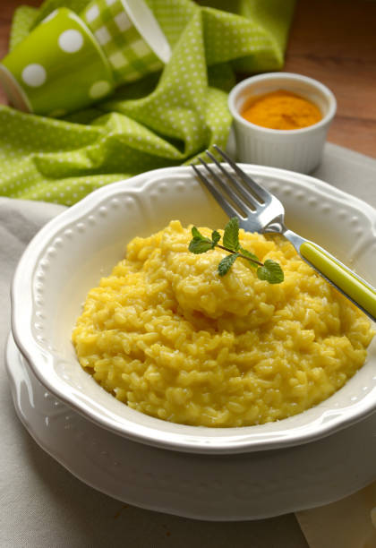 istock italian risotto with mint leaf on porcelain plate 959193602